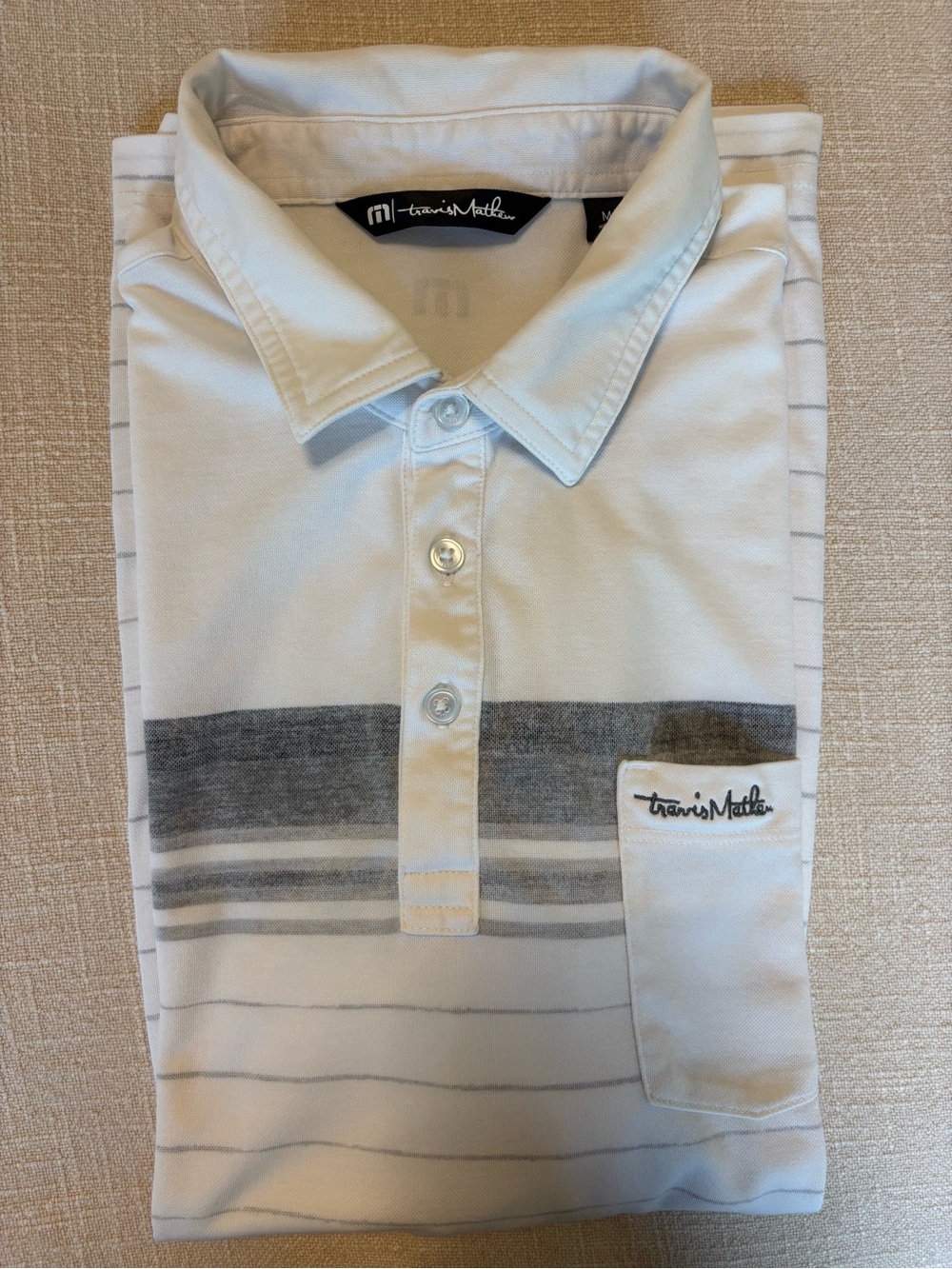 Travis Mathew White and Gray Striped Polo. Size Medium.